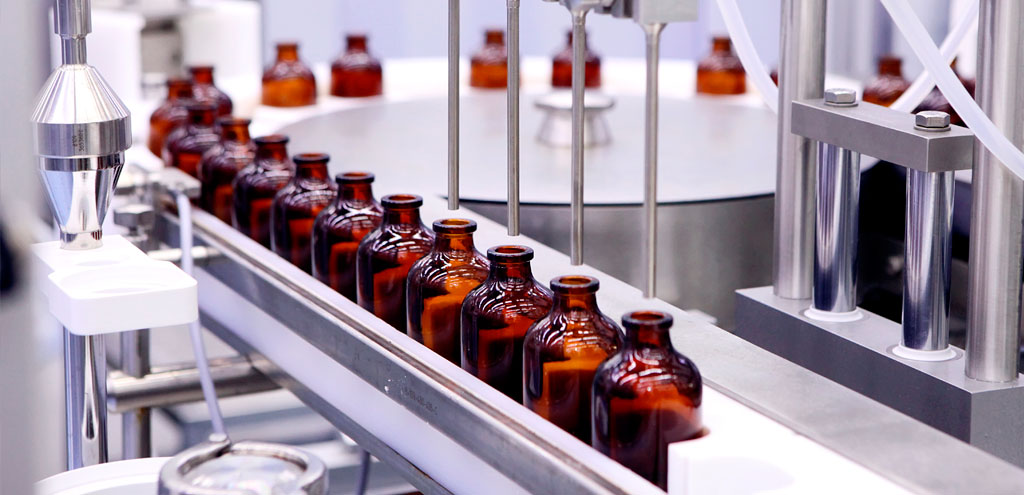 sterile bottles on conveyor belt